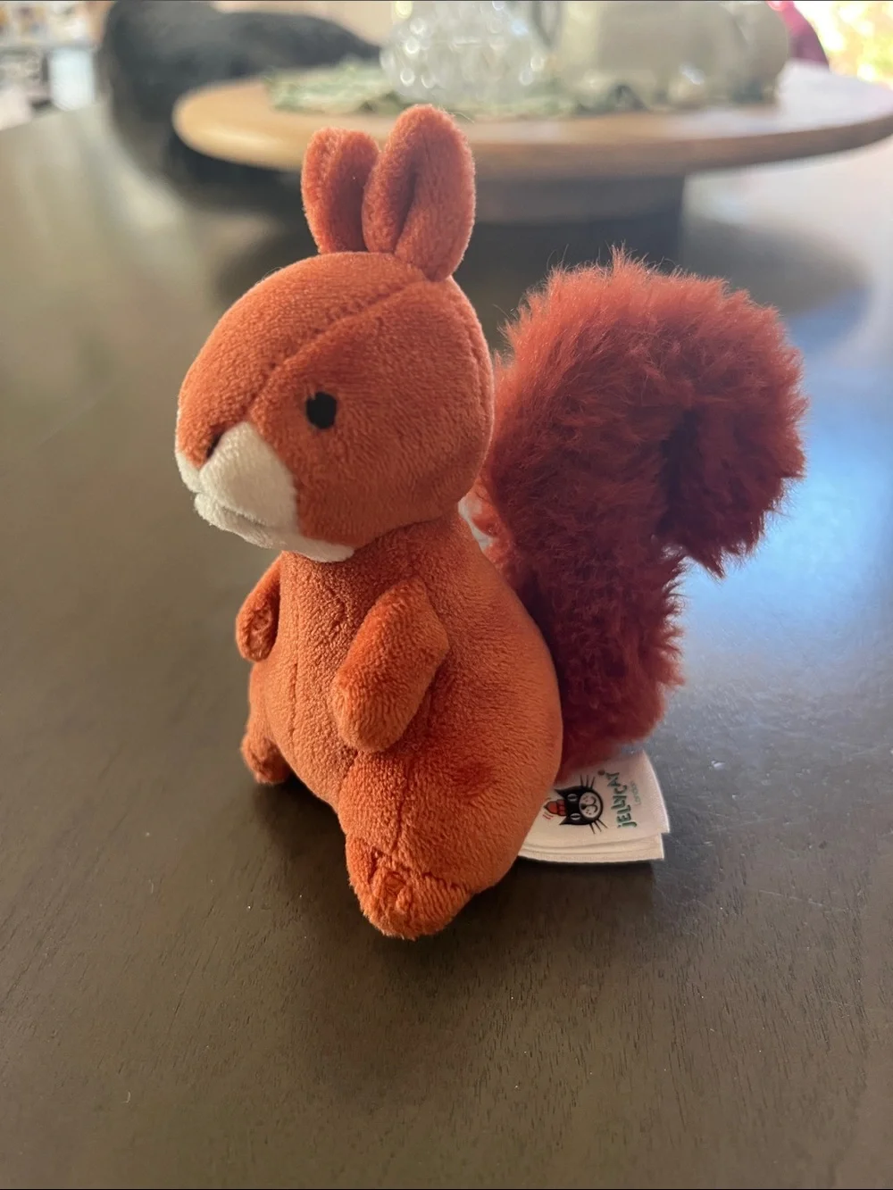 Jellycat Orange Squirrel with Fluffy Tail in Navy Plush Nest